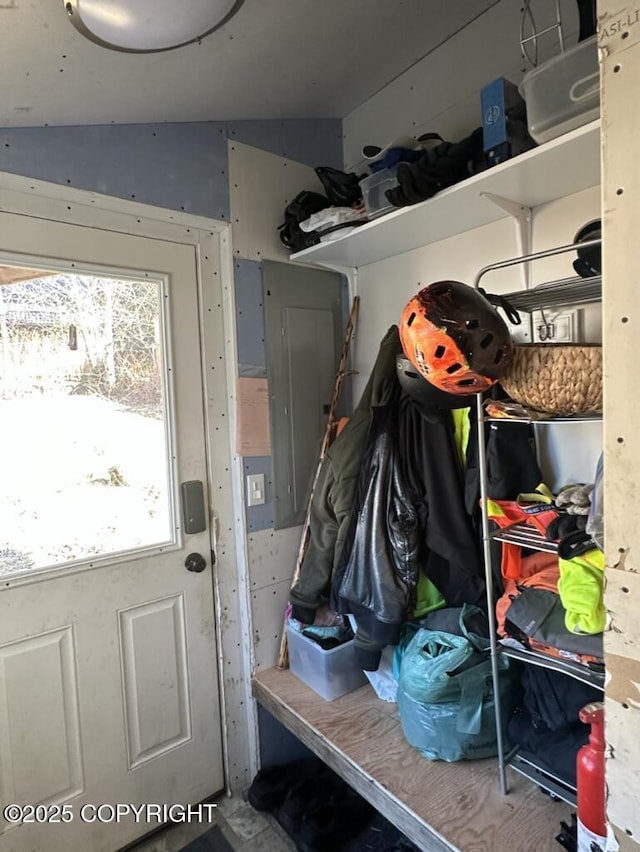 mudroom featuring electric panel