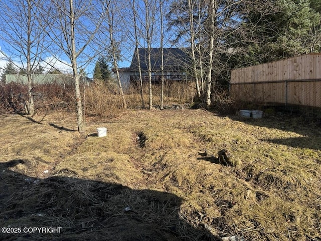 view of yard featuring fence