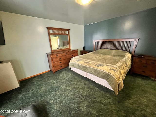 bedroom with carpet flooring and baseboards