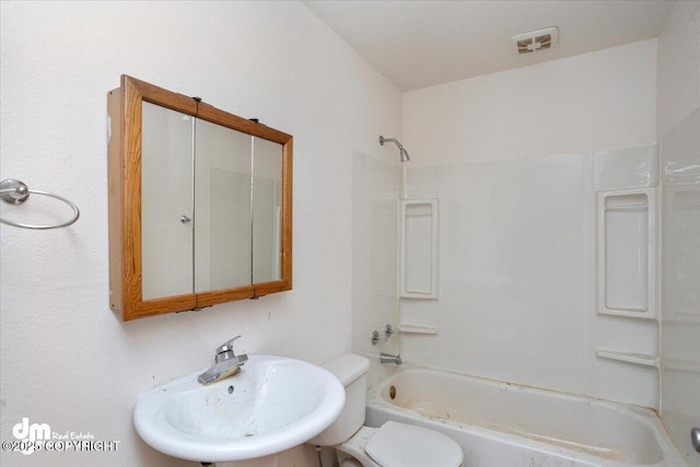 full bathroom with toilet, visible vents, a sink, and shower / bathing tub combination