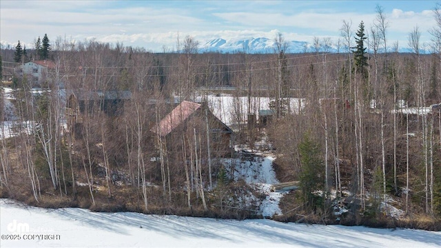 exterior space with a view of trees