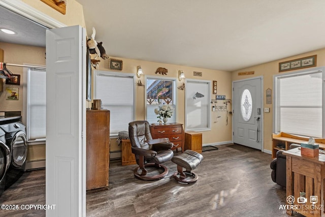 entrance foyer with baseboards and wood finished floors