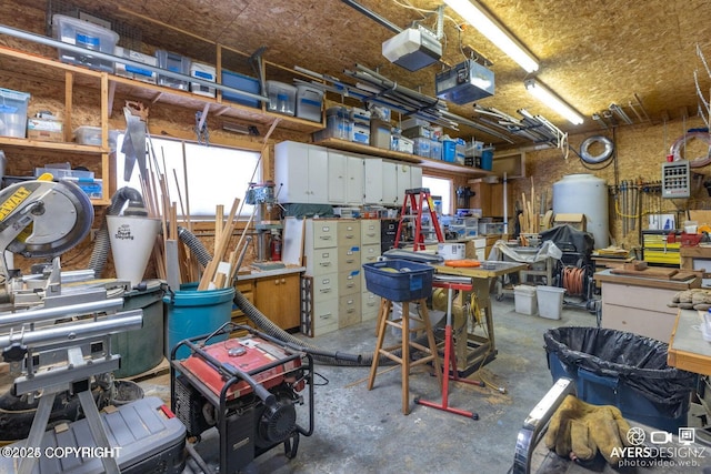 interior space featuring a workshop area and unfinished concrete flooring