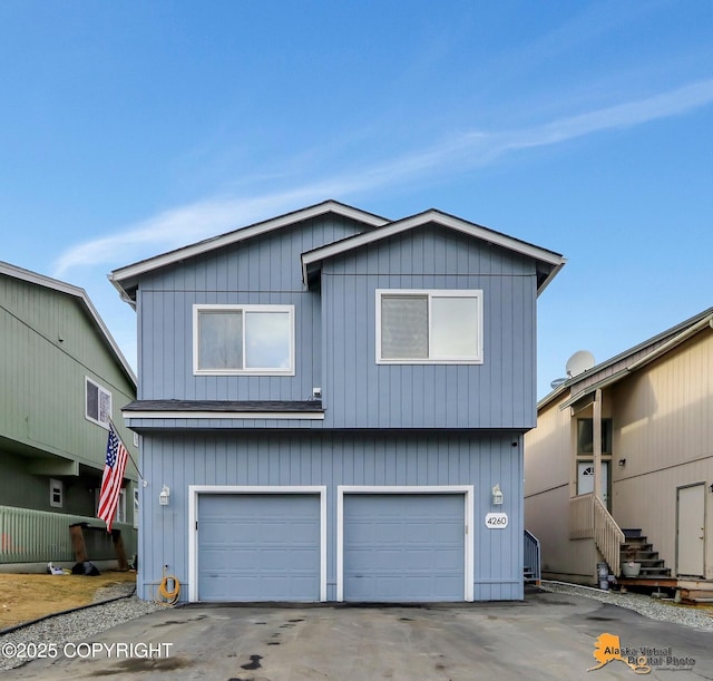 view of front of house with a garage and driveway