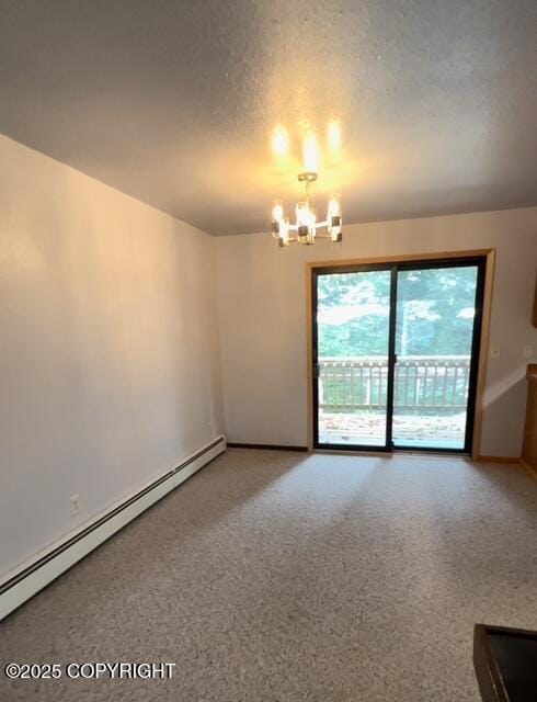 unfurnished room with a baseboard heating unit, a chandelier, and a textured ceiling