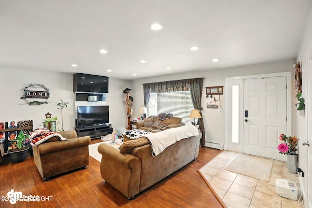 7210 Akutan Cir, Anchorage, AK 99504 - living room with baseboard heating, wood finished floors, and recessed lighting