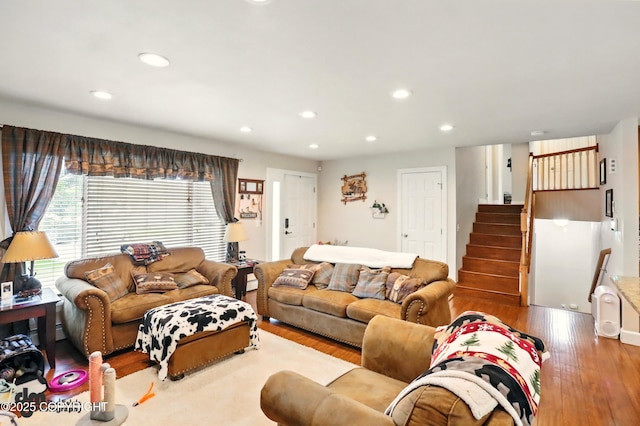 7210 Akutan Cir, Anchorage, AK 99504 - living area with wood finished floors, recessed lighting, and stairs