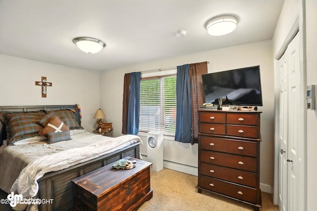 7210 Akutan Cir, Anchorage, AK 99504 - bedroom featuring light carpet, a baseboard radiator, and a closet