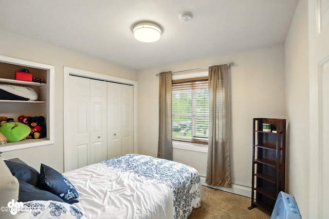 7210 Akutan Cir, Anchorage, AK 99504 - bedroom with carpet flooring, baseboard heating, and a closet
