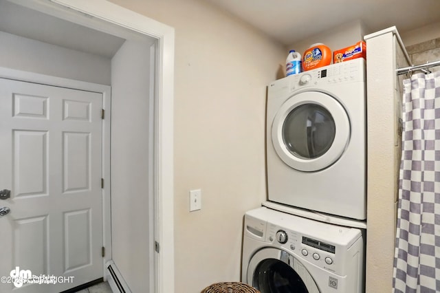 7210 Akutan Cir, Anchorage, AK 99504 - clothes washing area with stacked washer / dryer and a baseboard radiator
