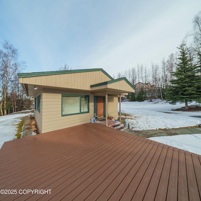 view of snow covered deck