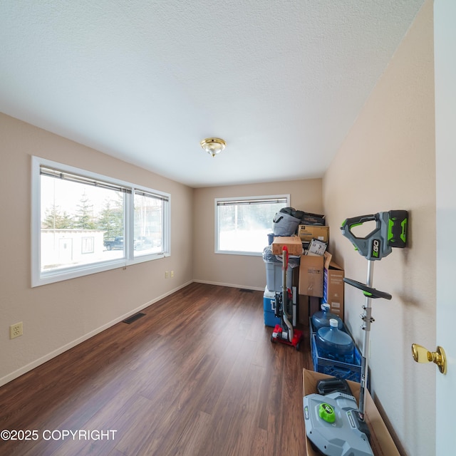 221 Creekside St, Anchorage, AK 99504 - miscellaneous room featuring wood finished floors and baseboards