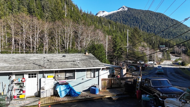 property view of mountains with a wooded view