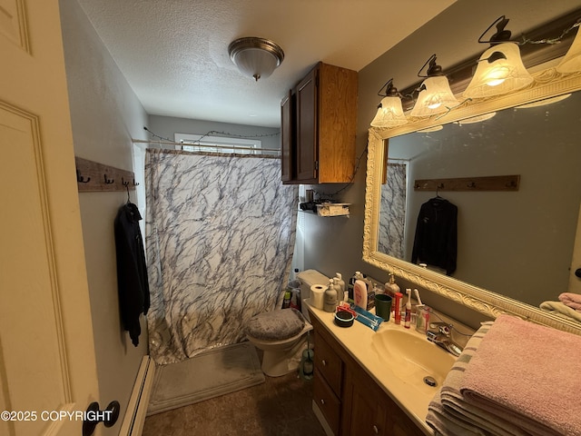 bathroom with a shower with curtain, a textured ceiling, baseboard heating, and vanity