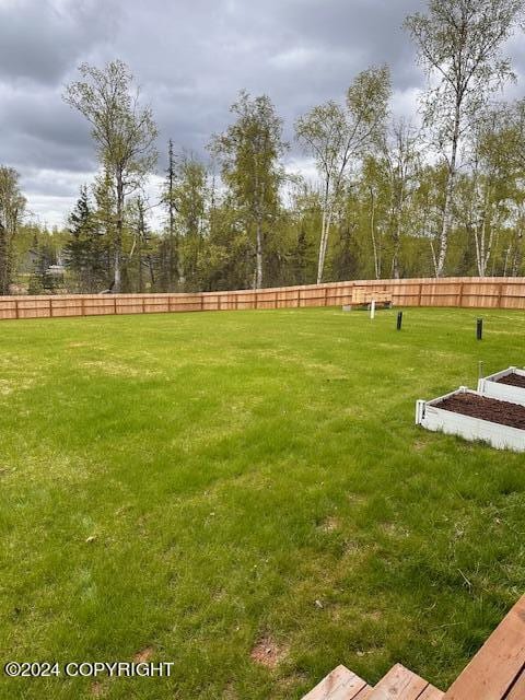 view of yard with fence