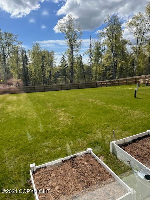 view of yard with fence