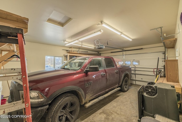 garage featuring a garage door opener