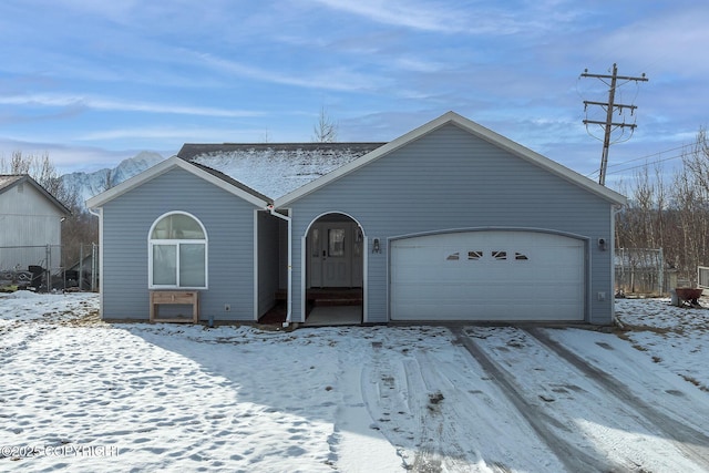 ranch-style home featuring an attached garage