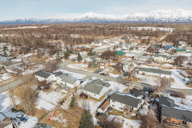 birds eye view of property with a residential view and a mountain view