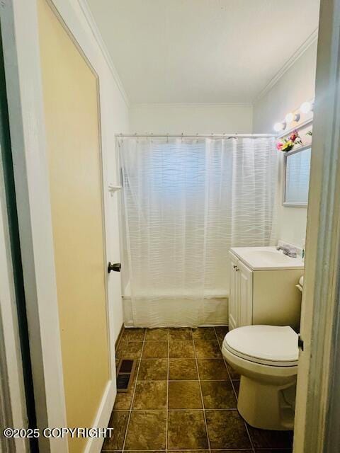 bathroom featuring toilet, shower / tub combo, ornamental molding, and vanity