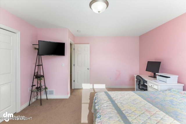 bedroom featuring carpet and baseboards