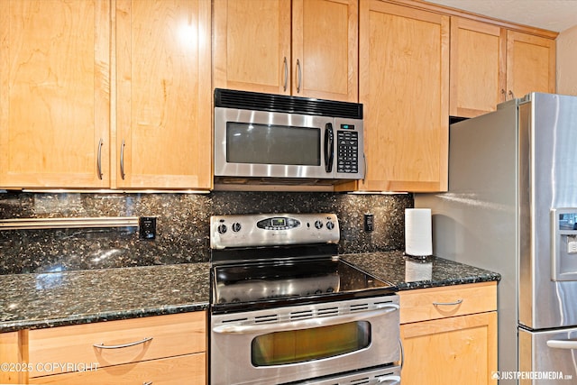 kitchen featuring tasteful backsplash, appliances with stainless steel finishes, and light brown cabinetry