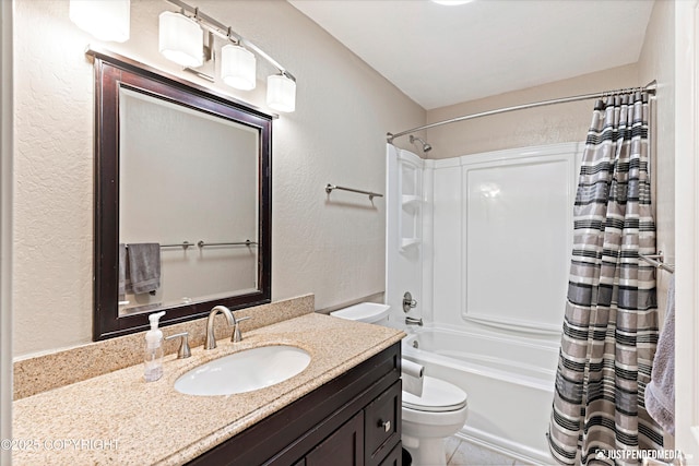 full bath featuring toilet, a textured wall, shower / bathtub combination with curtain, and vanity