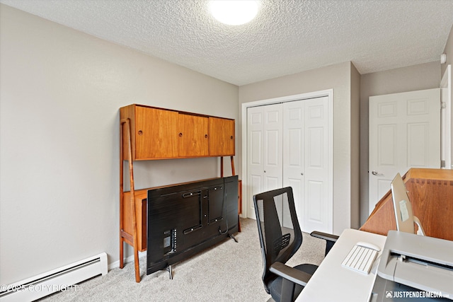 home office featuring a baseboard radiator, a textured ceiling, and light colored carpet