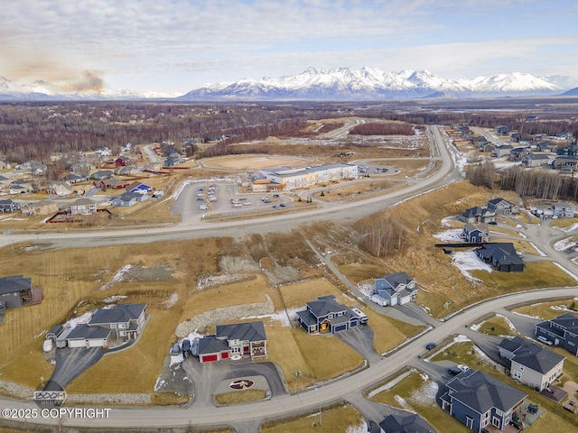 drone / aerial view with a residential view and a mountain view