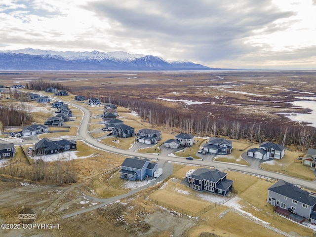 aerial view featuring a residential view and a mountain view