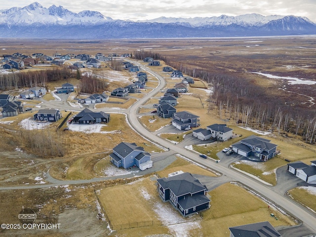 aerial view featuring a residential view and a mountain view