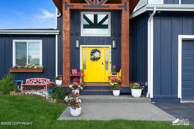 view of exterior entry featuring board and batten siding