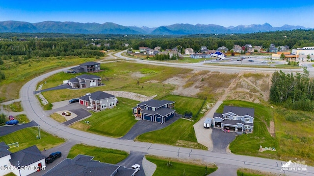 drone / aerial view featuring a mountain view