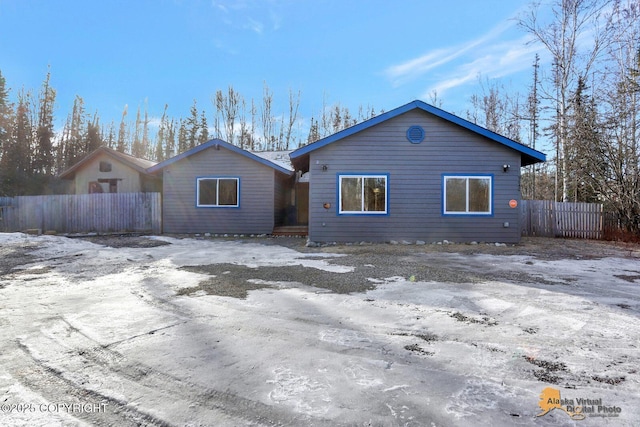 view of front of house with fence