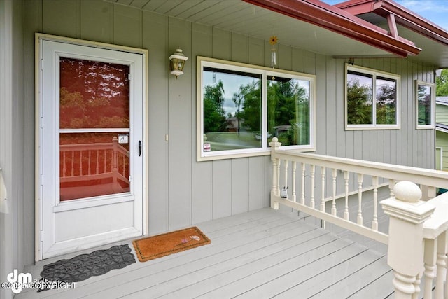 doorway to property with a deck