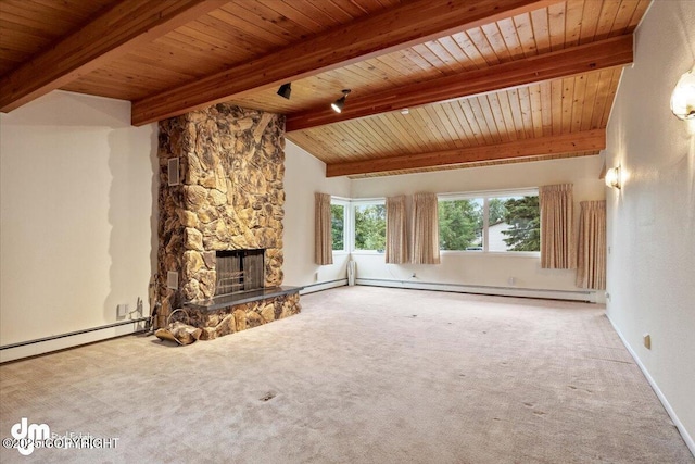 unfurnished living room featuring a baseboard radiator, beam ceiling, wooden ceiling, and a fireplace