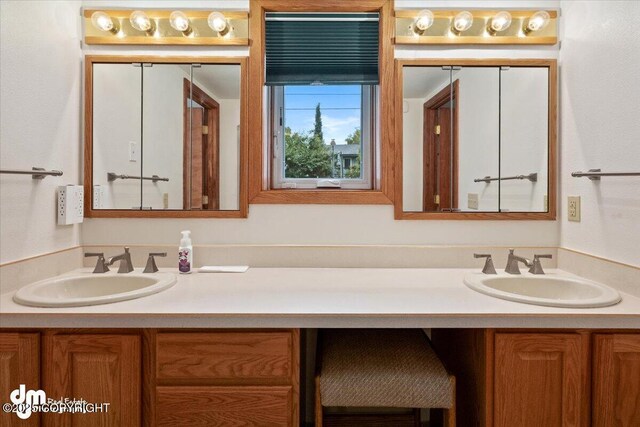 full bathroom with vanity