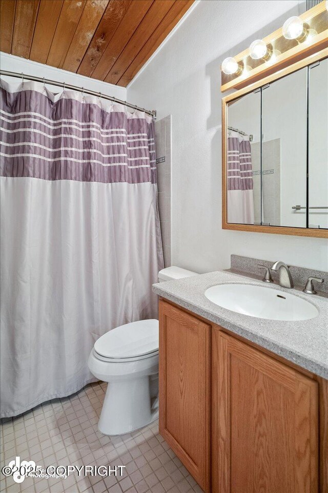 bathroom featuring vanity, wooden ceiling, curtained shower, and toilet