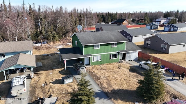 408 Haller St, Kenai, AK 99611 - aerial view of residential area featuring a heavily wooded area