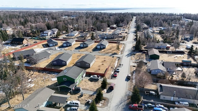 408 Haller St, Kenai, AK 99611 - aerial perspective of suburban area featuring a heavily wooded area