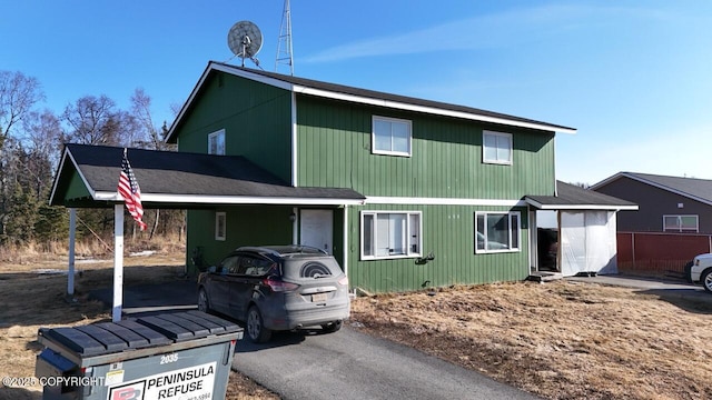 408 Haller St, Kenai, AK 99611 - view of front facade with an attached carport and asphalt driveway
