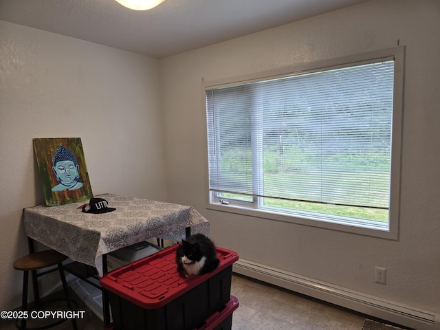408 Haller St, Kenai, AK 99611 - dining area with a baseboard heating unit and baseboards