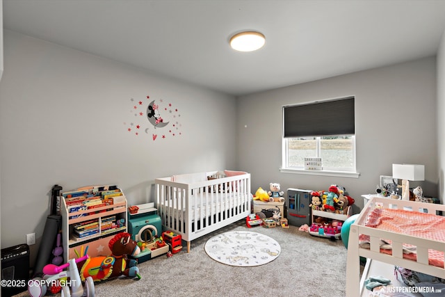 bedroom featuring a crib and carpet