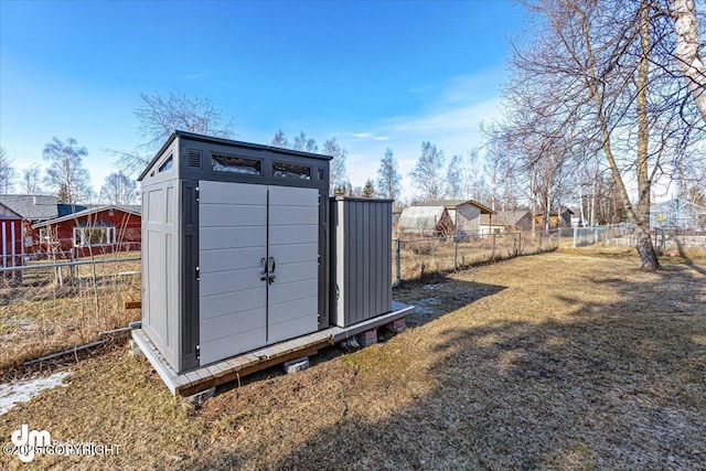 view of shed featuring a fenced backyard