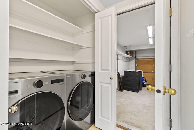 laundry room featuring laundry area and washer and dryer