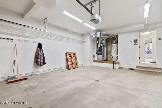 garage featuring water heater, heating unit, and a garage door opener