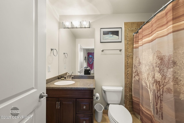 full bath featuring toilet, curtained shower, and vanity