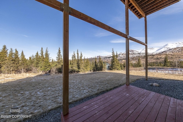 wooden terrace with a mountain view