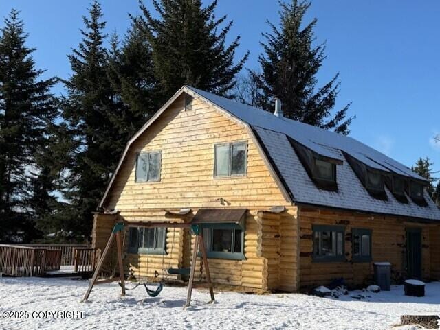 exterior space featuring a gambrel roof