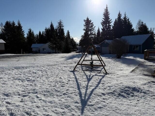 view of yard covered in snow